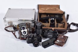 A YASHICA-MAT TLR CAMERA with 80mm lenses one at f3.2 the other at f3.5, two Yashica FR film SLR