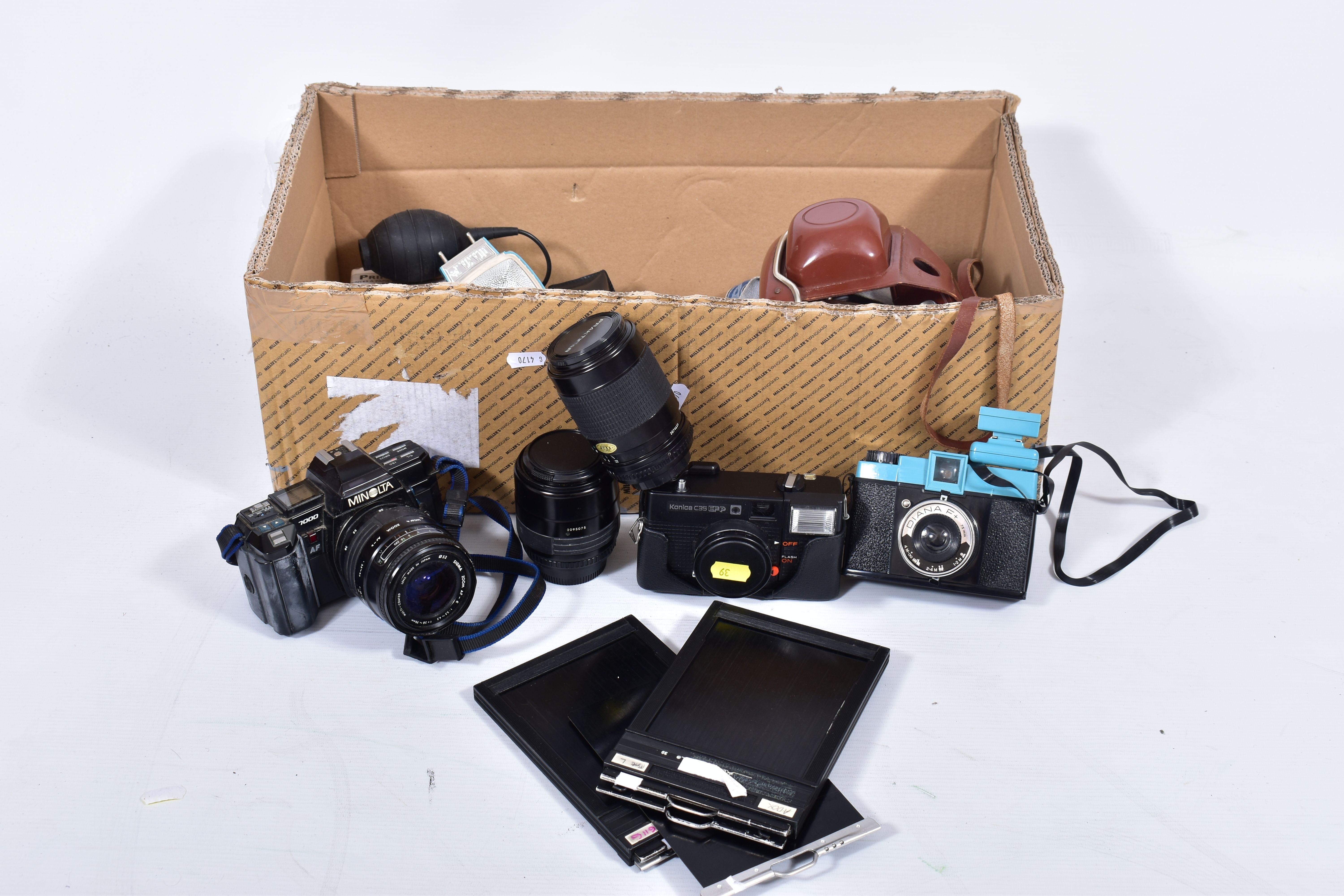 A TRAY CONTAINING CAMERAS AND EQUIPMENT including a Praktica MTL3 fitted with a 50mm f2.8 lens, a