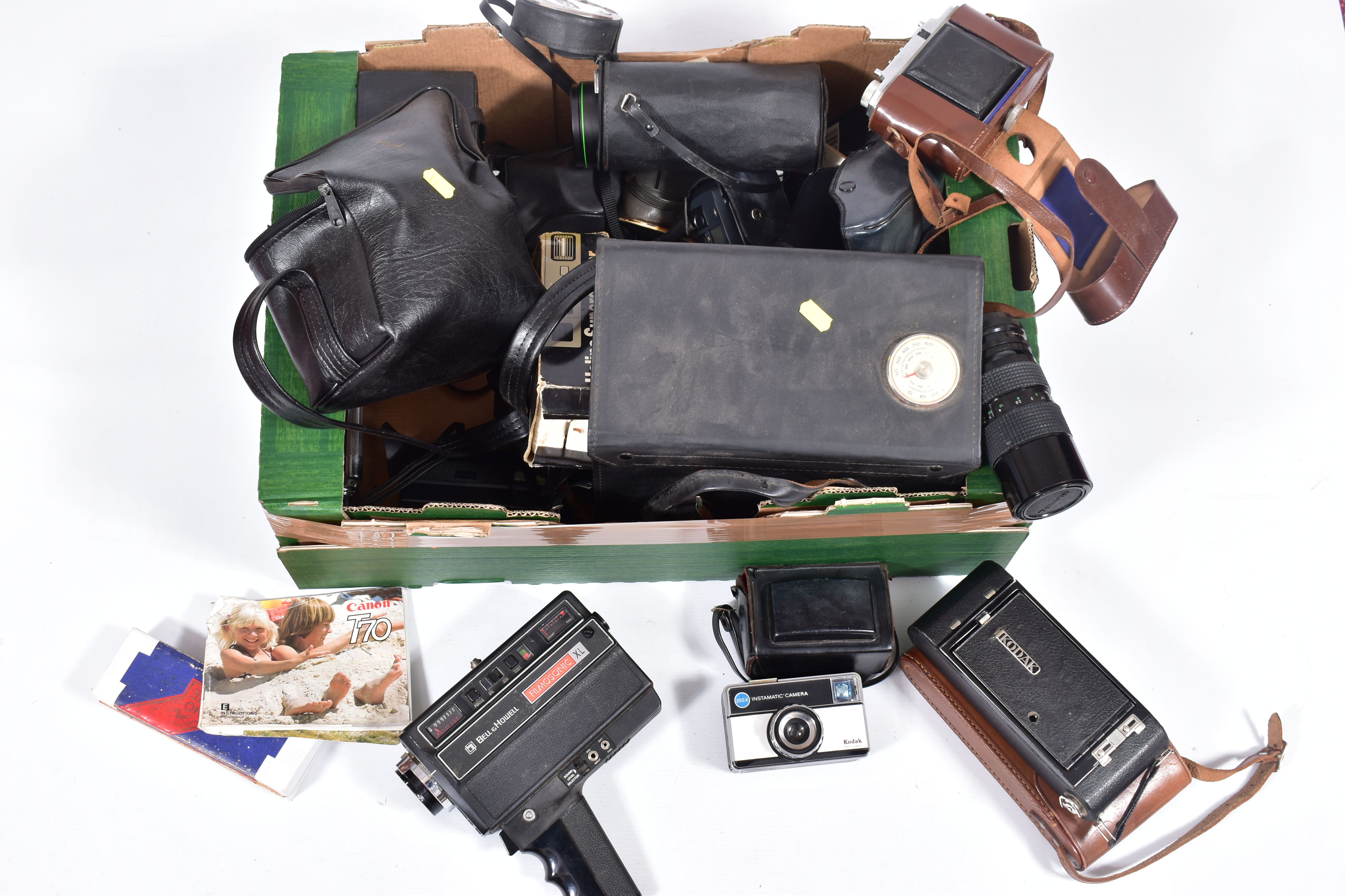 A TRAY CONTAINING CAMERAS AND EQUIPMENT including a Canon T70 film SLR fitted with a Tokina 28- - Image 2 of 8