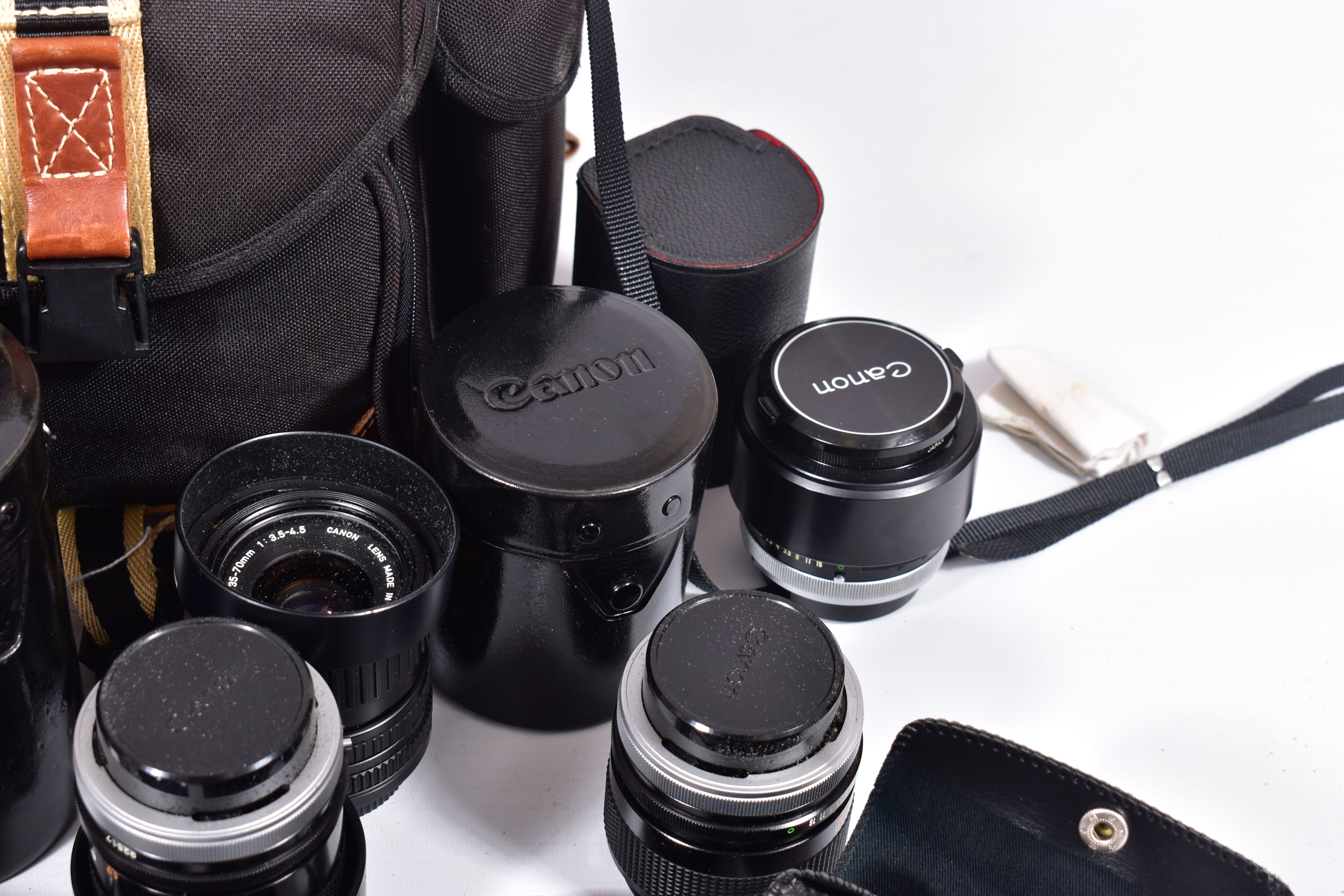 A CAMERA BAG CONTAINING A CANON FTb QL FILM SLR CAMERA , a FD SSC 50mm f1.4 lens, a FD 35mm f2 in - Image 4 of 7