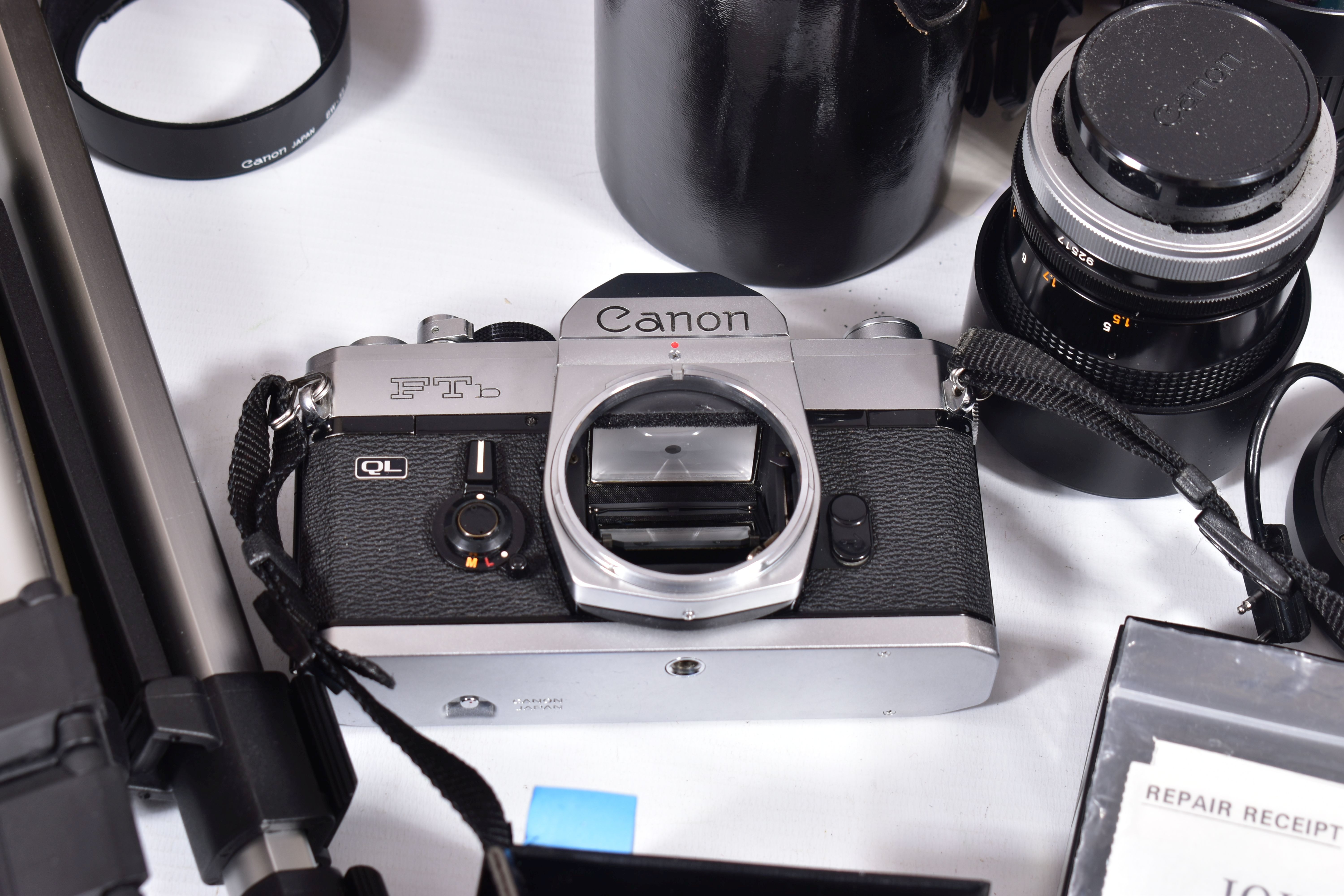 A CAMERA BAG CONTAINING A CANON FTb QL FILM SLR CAMERA , a FD SSC 50mm f1.4 lens, a FD 35mm f2 in - Image 2 of 7