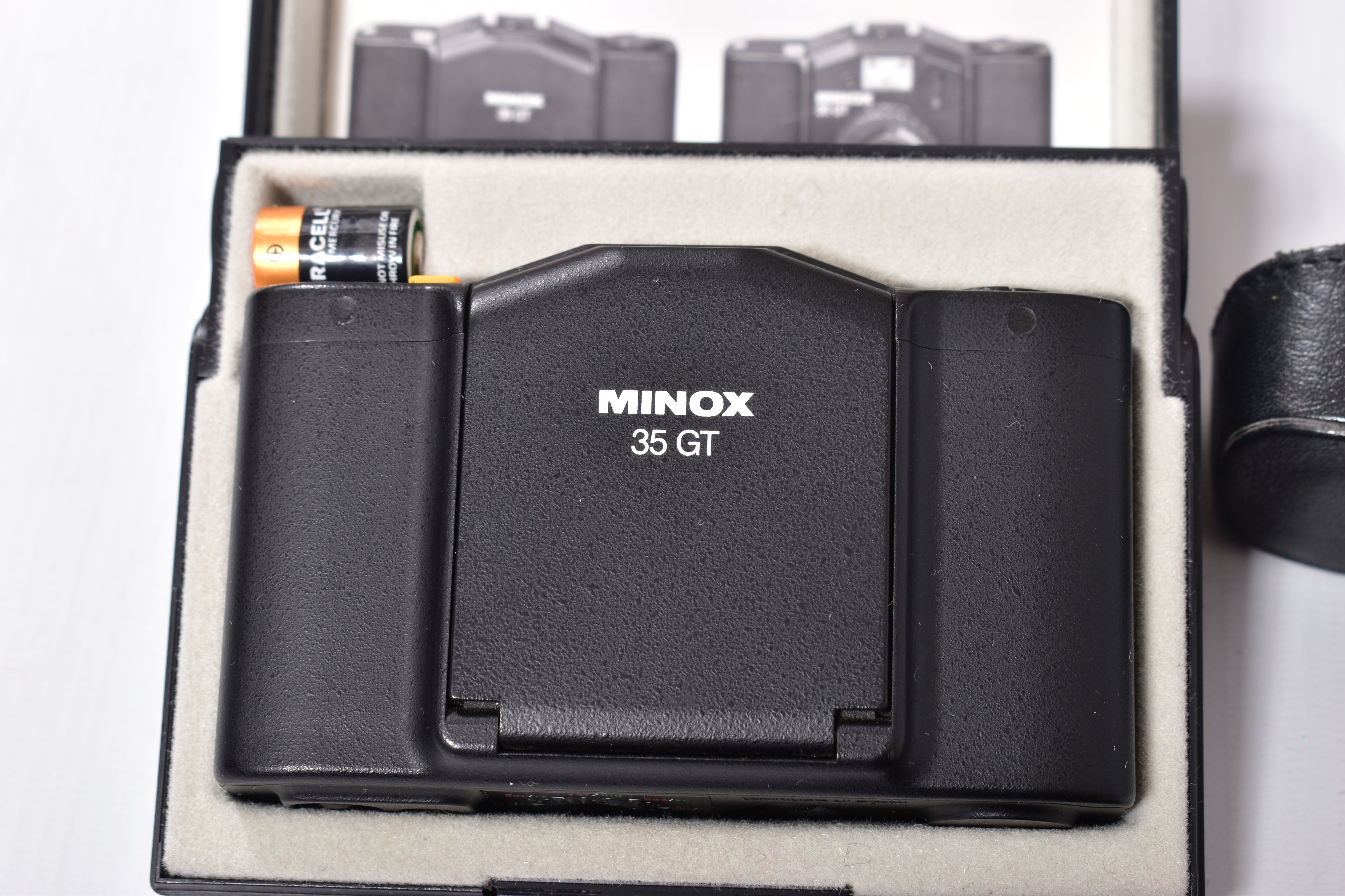 A MINOX 35GT FILM CAMERA in case with a leather pouch - Image 2 of 6