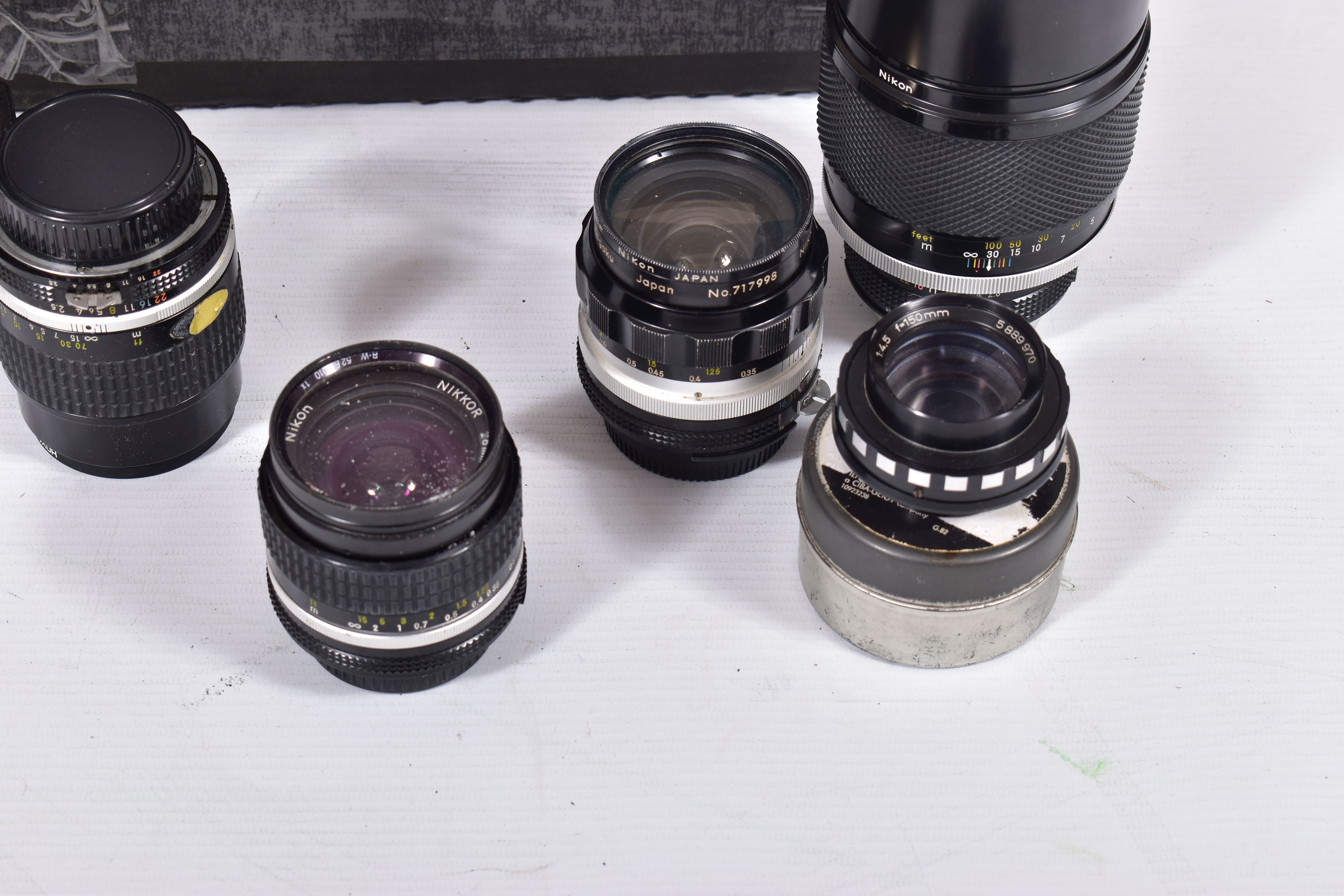 A SMALL TRAY CONTAINING MOSTLY VINTAGE NIKON CAMERA LENSES comprising of a H-Auto 300mm f4.5 in - Image 3 of 5