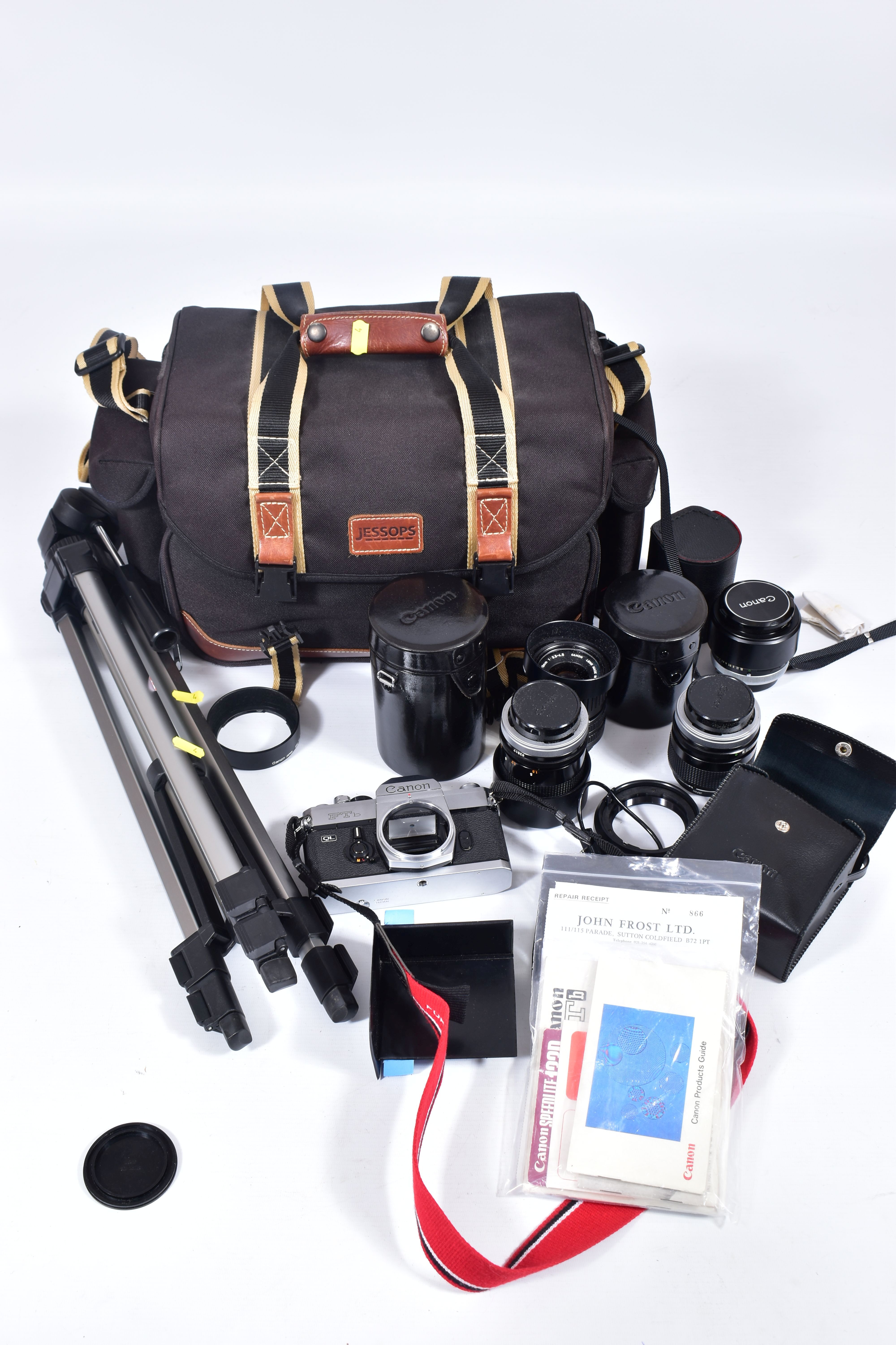 A CAMERA BAG CONTAINING A CANON FTb QL FILM SLR CAMERA , a FD SSC 50mm f1.4 lens, a FD 35mm f2 in