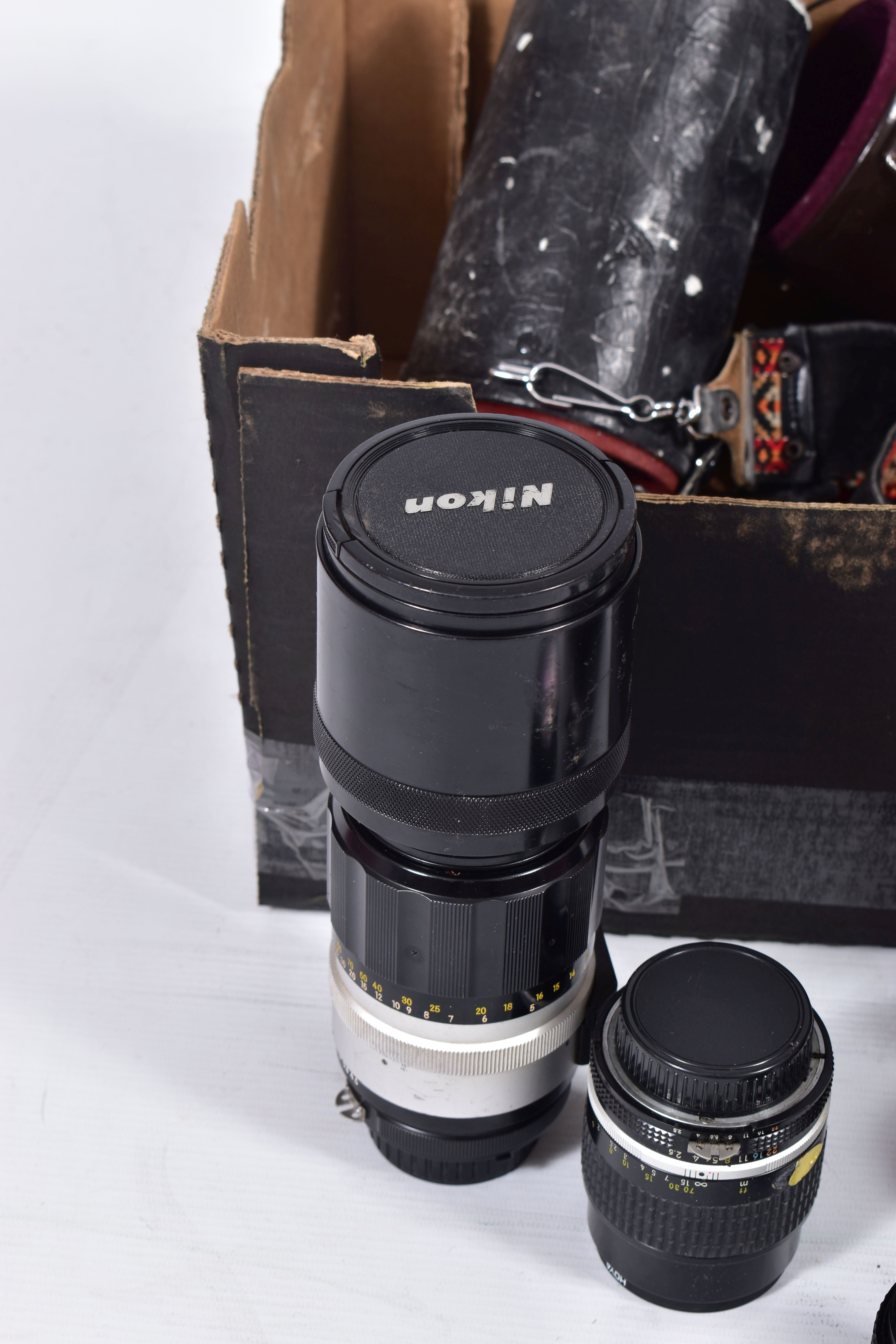 A SMALL TRAY CONTAINING MOSTLY VINTAGE NIKON CAMERA LENSES comprising of a H-Auto 300mm f4.5 in - Image 2 of 5