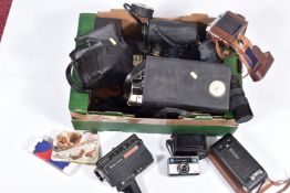 A TRAY CONTAINING CAMERAS AND EQUIPMENT including a Canon T70 film SLR fitted with a Tokina 28-