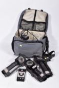 A PADDED CAMERA BAG CONTAINING METZ FLASH EQUIPMENT including two 45CT-4, a 45CT-1, a SCA 300C