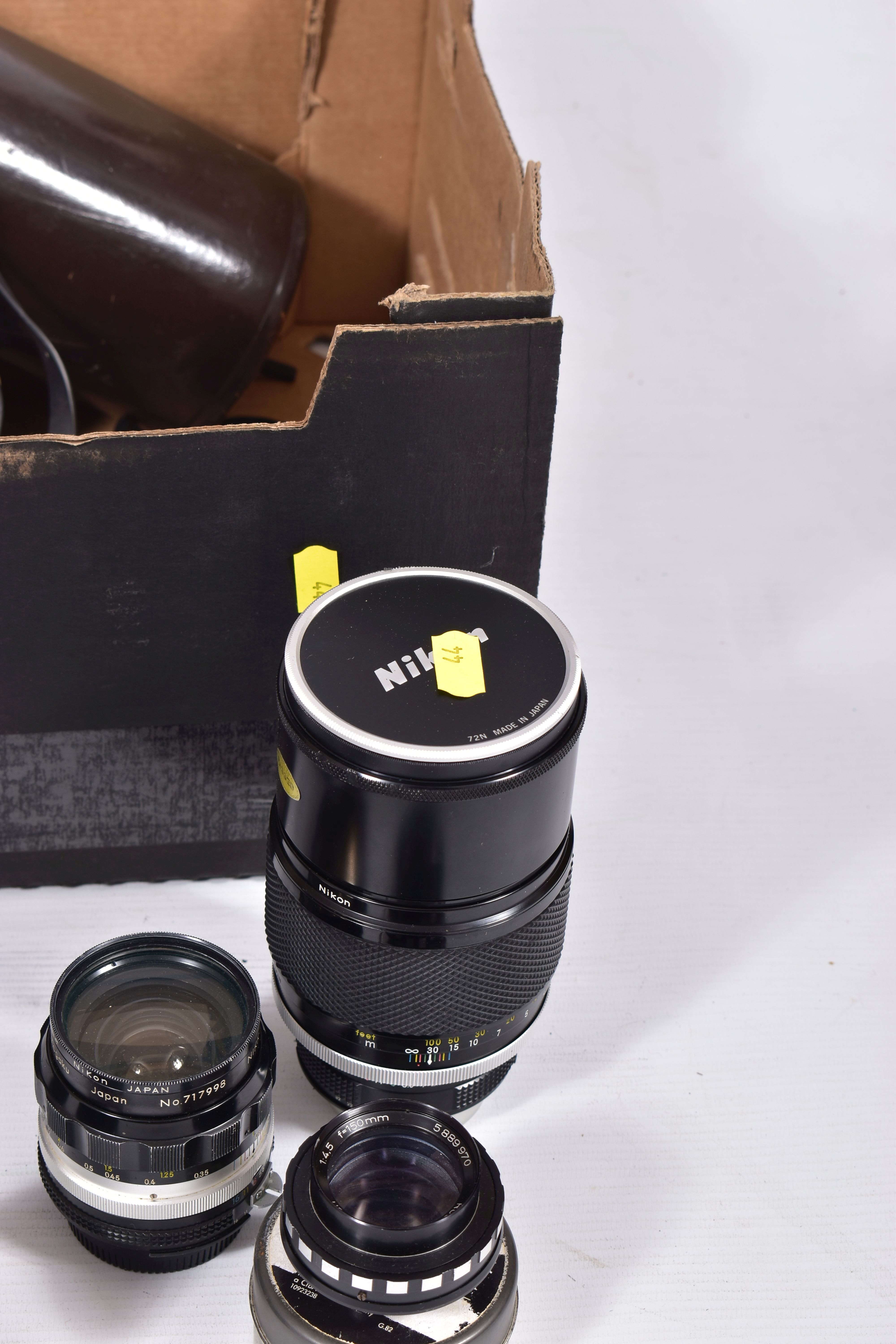 A SMALL TRAY CONTAINING MOSTLY VINTAGE NIKON CAMERA LENSES comprising of a H-Auto 300mm f4.5 in - Image 4 of 5