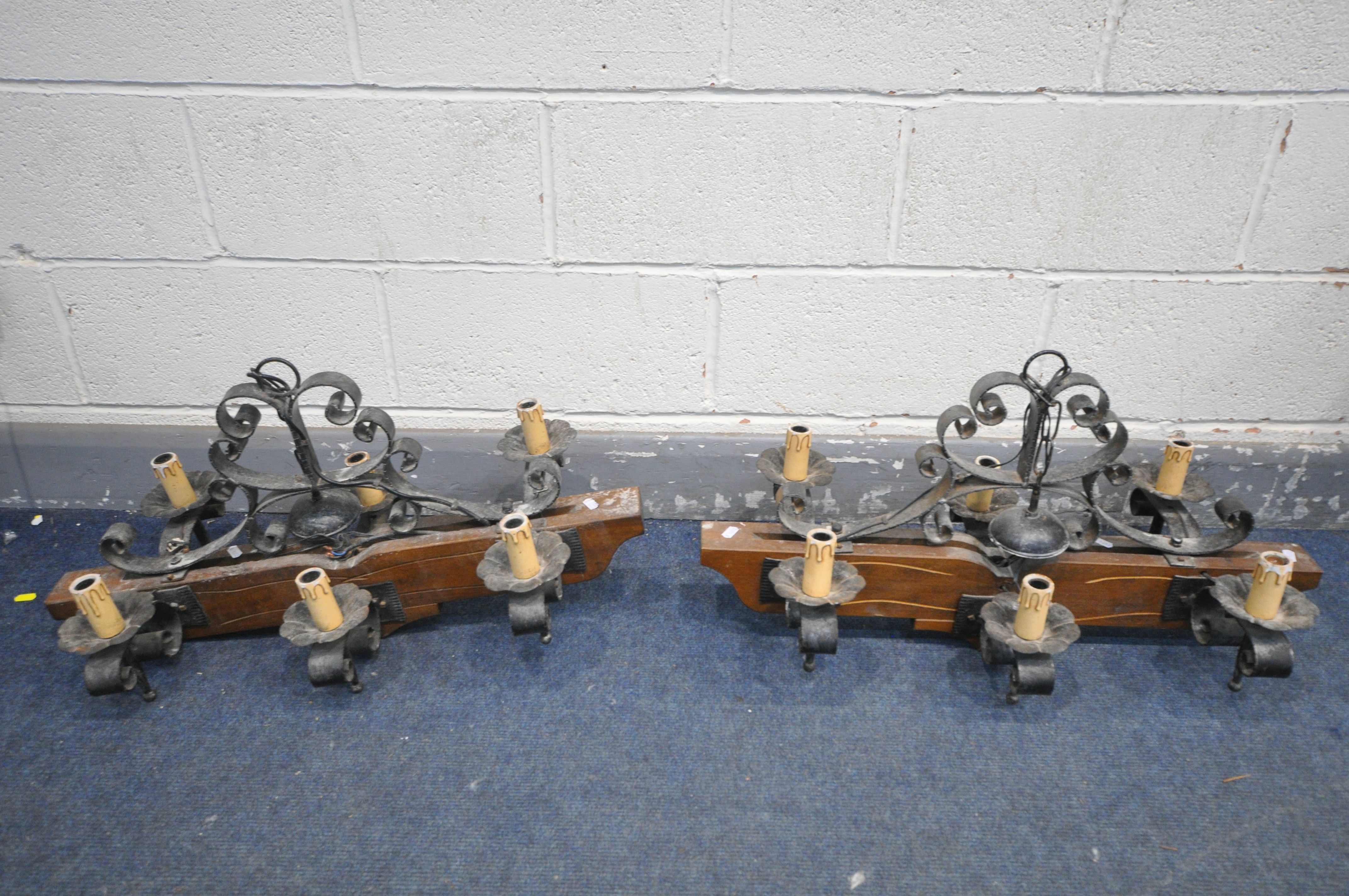 A PAIR OF FRENCH WROUGHT SIX BRANCH CEILING LIGHTS, width 65cm x drop 60cm