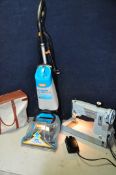 A VAX CCW201 CARPET CLEANER along with a Singer 357k sewing machine with light and foot pedal (