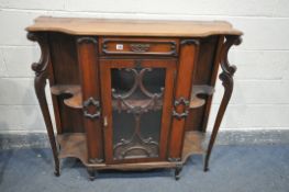 AN EDWARDIAN WALNUT SIDEBOARD, with a single drawer, above an single glazed door, flanked by