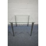 A CONTEMPORARY SQUARE GLASS TOP TABLE, on four shaped chrome legs, 86cm squared, height 75cm (good