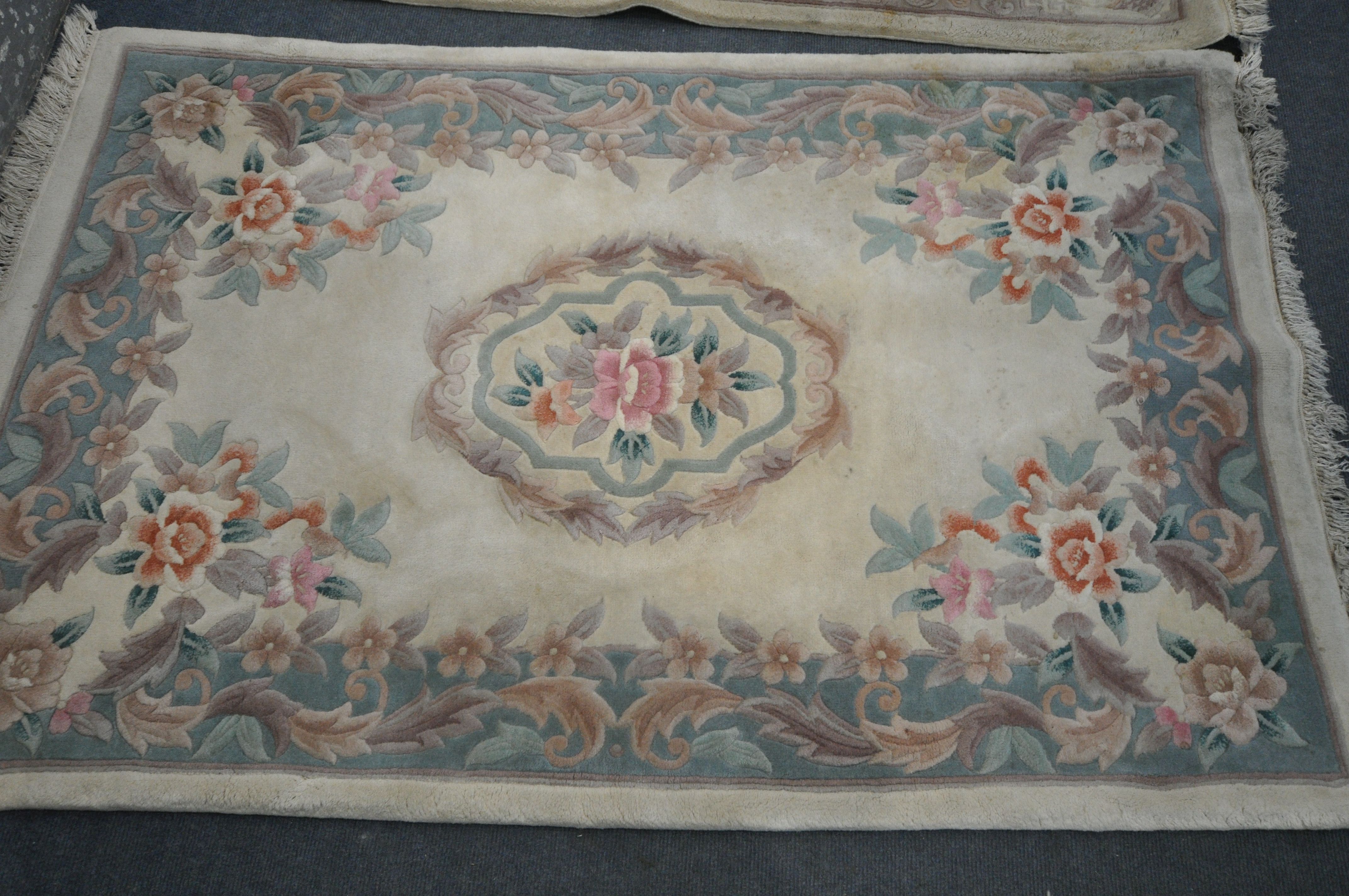 A SELECTION OF CHINESE WOOLLEN RUGS, of various sizes and styles, including the largest rug 183cm - Image 2 of 6