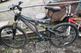 A SHOCKWAVE XT950 MOUNTAIN BIKE with front and rear suspension, 21 speed twist grip Shimano gears,