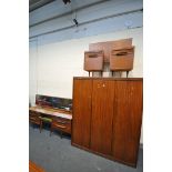 A MID CENTURY WHITE AND NEWTON TEAK BEDROOM SUITE, comprising a triple door wardrobe, a dressing