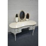 A CREAM FRENCH KIDNEY DRESSING TABLE, with triple mirrors, length 136cm x depth 54cm x height 132cm