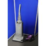 A PANASONIC MC-E54 UPRIGHT VACUUM along with a Beldray BEL0591SAFOB handheld vacuum (PAT pass and