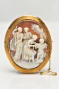 A MID 19TH CENTURY YELLOW METAL CAMEO BROOCH, the shell cameo, carved in high relief, depicting