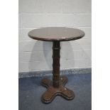 A 20TH CENTURY OAK CIRCULAR PUB TABLE, with shaped support and feet, diameter 77cm x height 110cm (