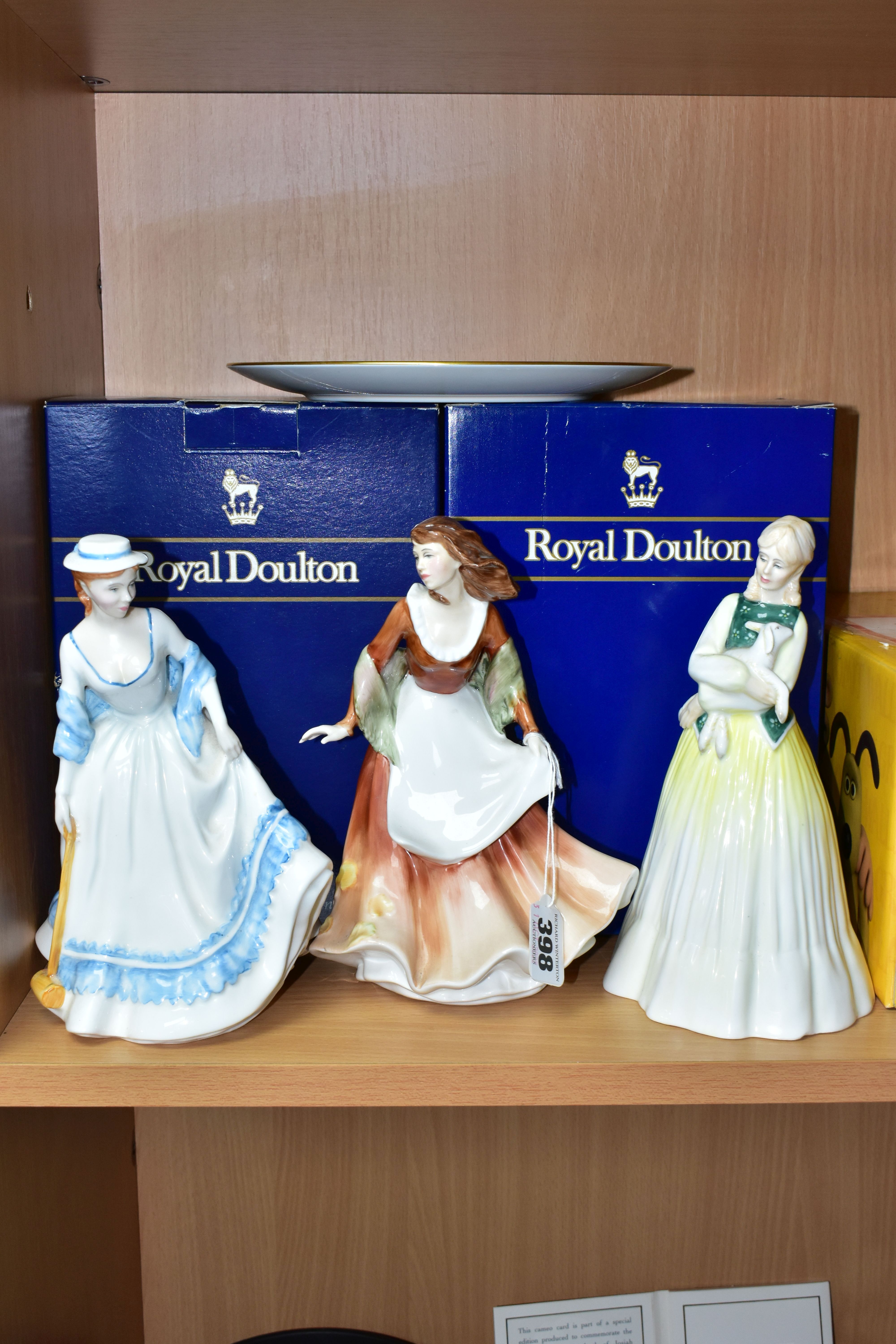 THREE ROYAL DOULTON INTERNATIONAL COLLECTORS CLUB LADY FIGURES AND A COLLECTORS PLATE, comprising '