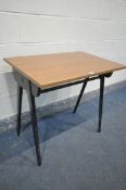 A MID CENTURY ESAVIAN WALNUT FINISH AND WROUGHT IRON TABLE, width 84cm x depth 56cm x height 76cm