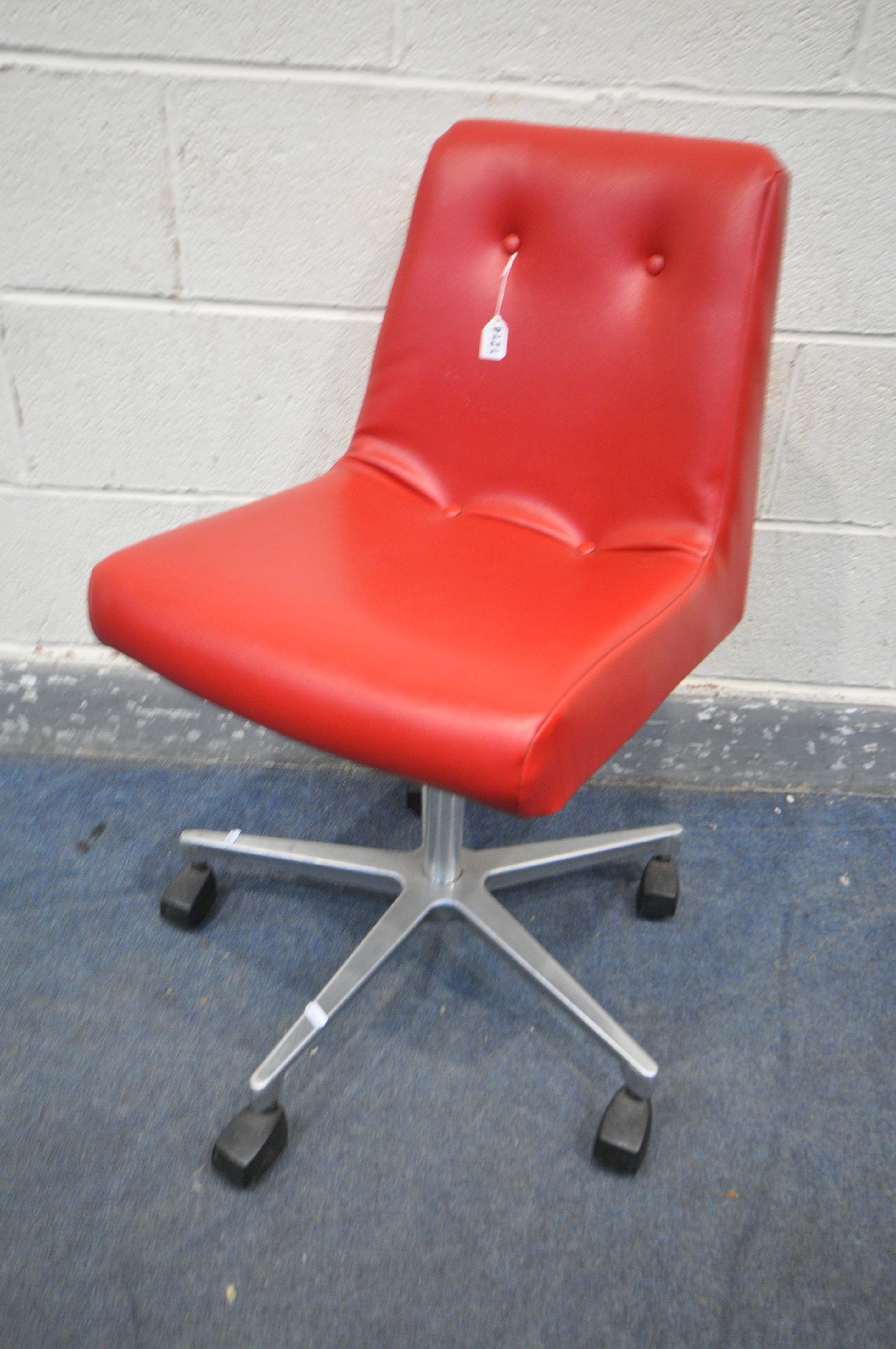 A MORRIS OF GLASGOW RED LEATHERETTE SWIVEL CHAIR