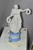 A BOXED WEDGWOOD 'FLORAL CORONET' FIGURINE, from The Dancing Hours Collection, in white on a pale