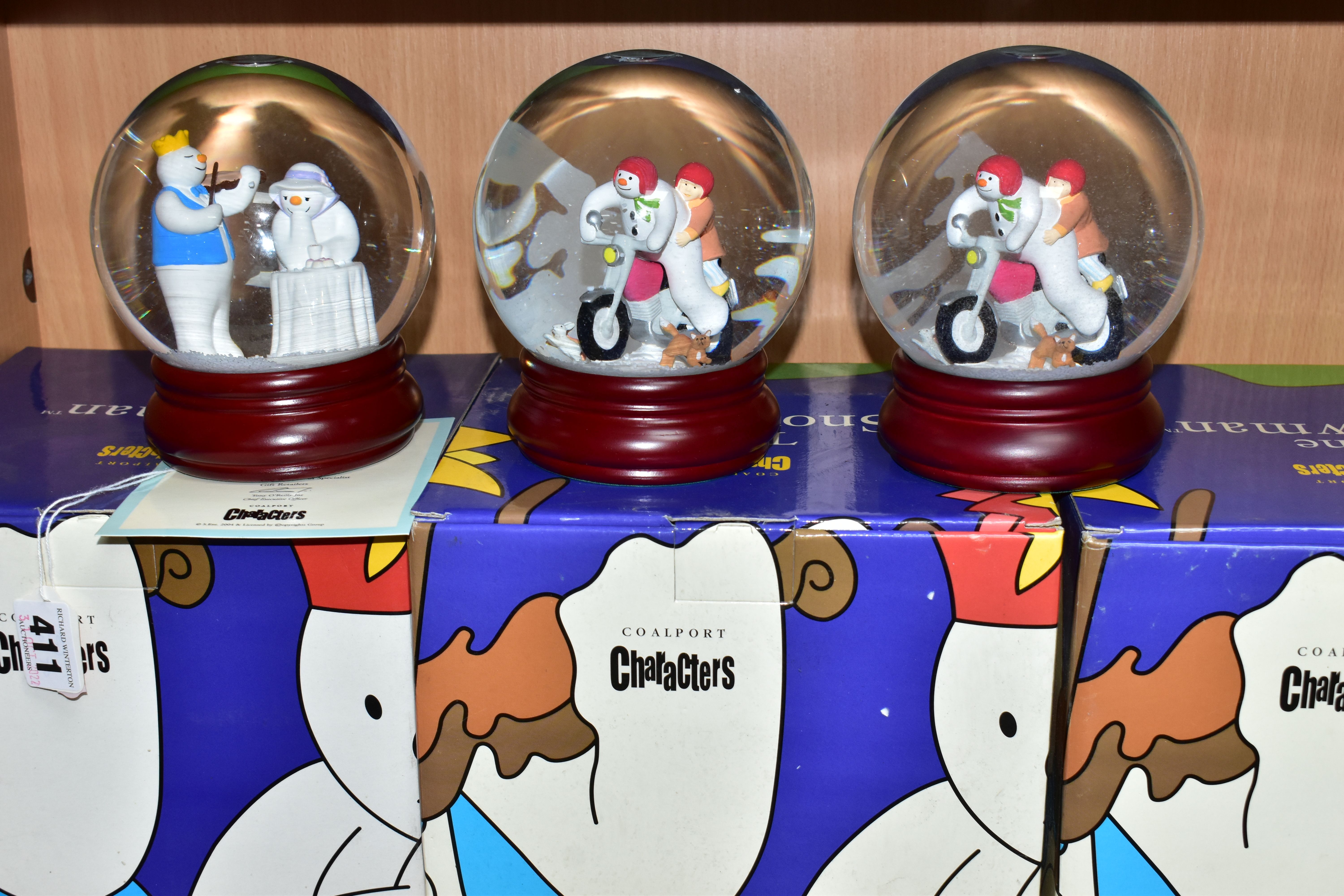 THREE BOXED COALPORT THE SNOWMAN CHARACTER SNOWGLOBES, comprising limited edition 'At the Party'