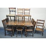 A 20TH CENTURY OAK BARLEY TWIST DROP LEAF DINING TABLE, united by a H stretcher, along with four oak