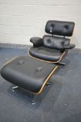 AFTER CHARLES AND RAY EAMES, a black leatherette Lounge chair and ottoman (condition:-worn finish to