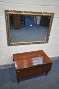 A GILT FRAMED BEVELLED EDGE WALL MIRROR, 105cm x 75cm, and a Victorian drop leaf coffee table with a