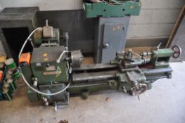A VINTAGE RHINO KB-165 METALWORKING LATHE with a 107cm long bed, speed adjustment from 46 to1053