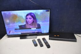 A SAMSUNG UE32H5500AK 32in TV with remote along with a Toshiba SD2010KB DVD player with remote (both