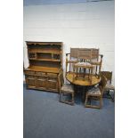 AN OLD CHARM OAK DINING SUITE, comprising a gate leg table, open width 144cm x closed width 50cm x