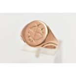 AN EARLY 20TH CENTURY, 9CT GOLD SIGNET RING, polished oval form with engraved initials, tapering