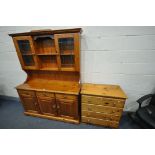 A MODERN PINE DRESSER, with three drawers, width 142cm x depth 47cm x height 187cm x height of