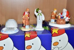 THREE BOXED COALPORT THE SNOWMAN CHARACTER FIGURES AND A BOXED CANDLE HOLDER, comprising The
