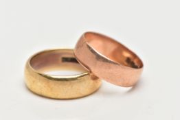 TWO WIDE 9CT GOLD BAND RINGS, the first a polished yellow gold band, approximate width 7.1mm,