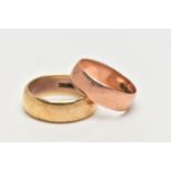 TWO WIDE 9CT GOLD BAND RINGS, the first a polished yellow gold band, approximate width 7.1mm,