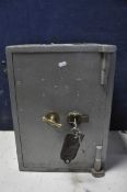 A CAST IRON SAFE bearing no makers name or model, with two keys