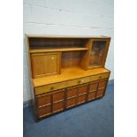 A MID CENTURY NATHAN TEAK HIGHBOARD, with an arrangement of cupboards and drawers, width 153cm x