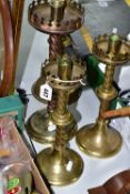 Four Brass Candelabras, with twisted stems and ornate patterned holders, heights (approximately)