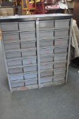 A METAL TOOL CHEST WITH TWO BANKS OF SIXTEEN DRAWS