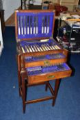 A WOODEN FREE STANDING INCOMPLETE CANTEEN, comprising cutlery with names to include 'Robert F Mosley