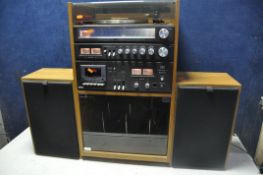 A ITT T30 STEREO TOWER with speakers inside wooden cabinet (PAT pass and working)
