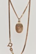 A 9CT GOLD LOCKET PENDANT NECKLACE, the locket of an oval form decorated with an engraved floral