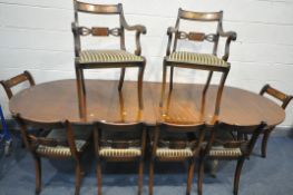 A REGENCY REPRODUCTION MAHOGANY TWIN PEDESTAL DINING TABLE, with two leaves, extended length 264cm x