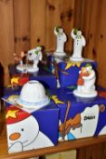 FOUR BOXED COALPORT THE SNOWMAN CHARACTER FIGURES AND A BOXED CANDLE HOLDER, comprising two x The