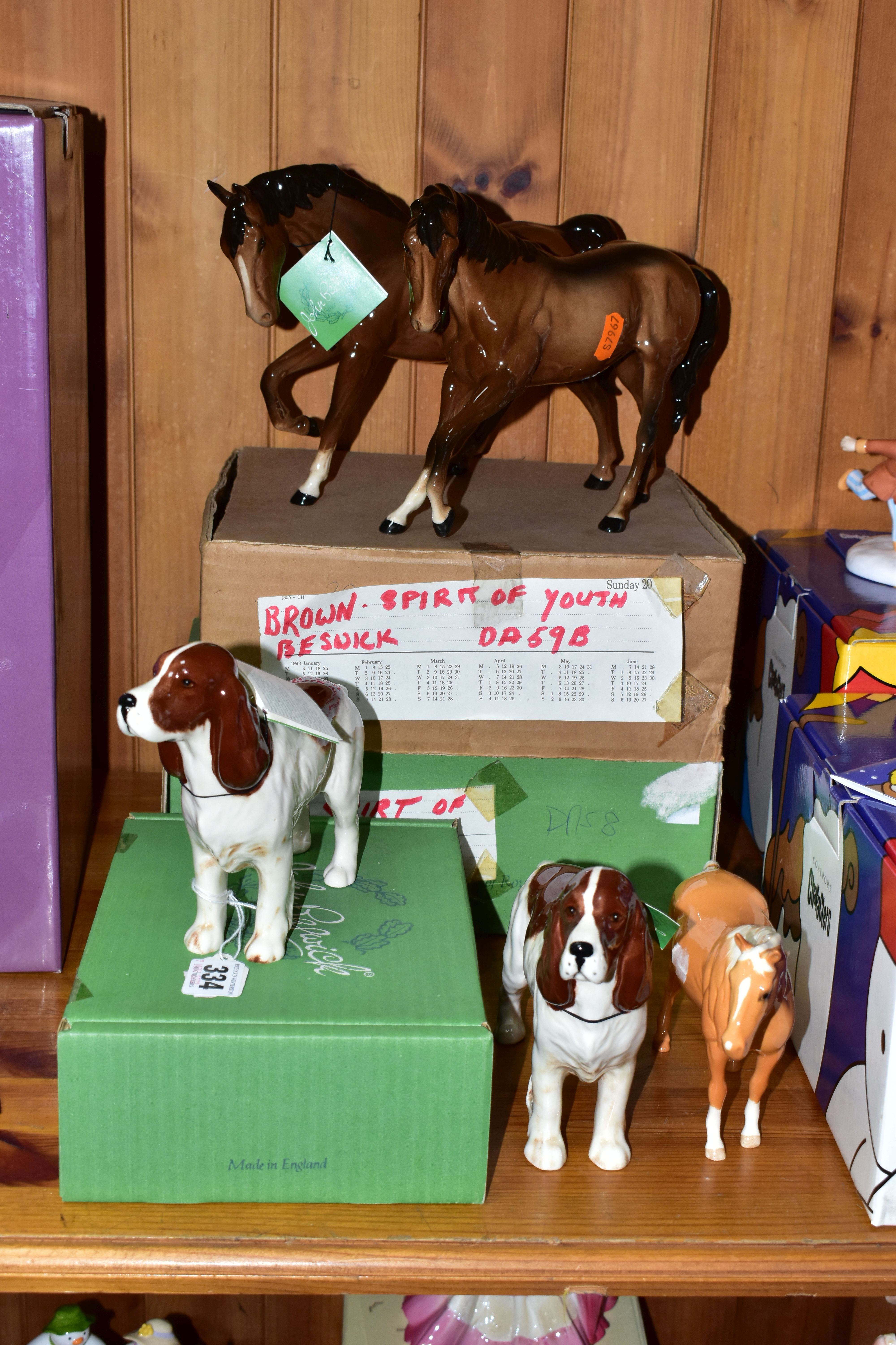 A GROUP OF BESWICK AND ROYAL DOULTON HORSES AND DOGS, comprising a boxed brown Beswick Spirit of