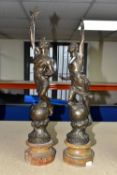 A PAIR OF FRENCH SPELTER FIGURES, possibly Le Jour and La Nuit on turned wooden bases (2) (Condition